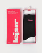 Calcetines barefoot Lejan negros con logo rosa, en su caja