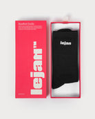 Calcetines barefoot Lejan negros con logo blanco, en su caja