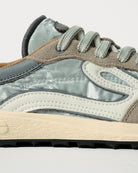 Lejan Melrose Silver - detalle del logo y mediasuela
